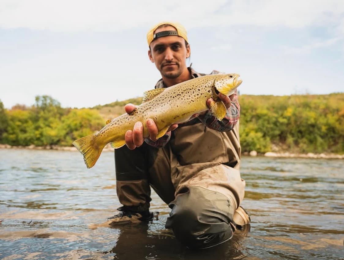 Portrait of Andrew Austin and a fish
