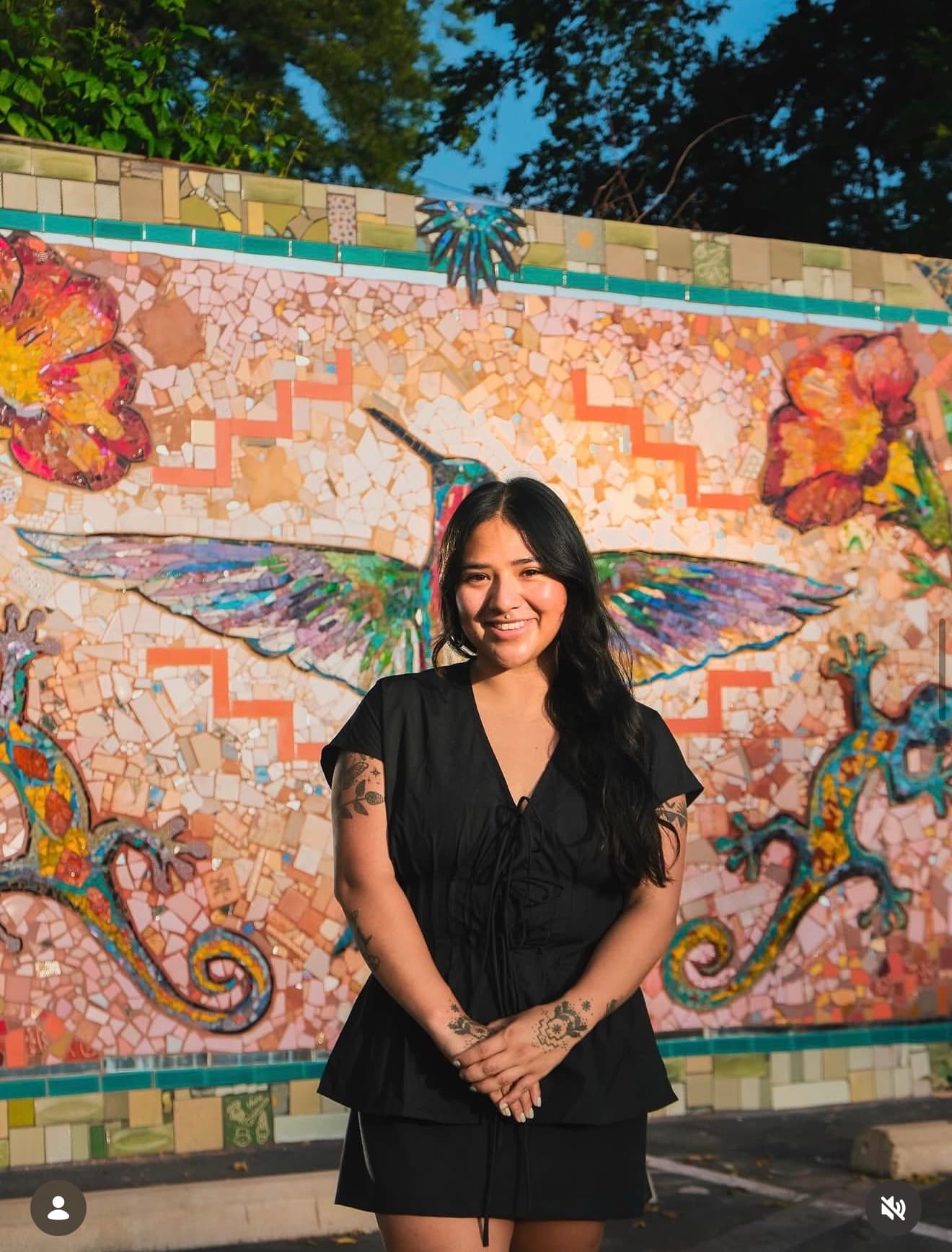 Artist Carmen Rangel with her mosaic artwork