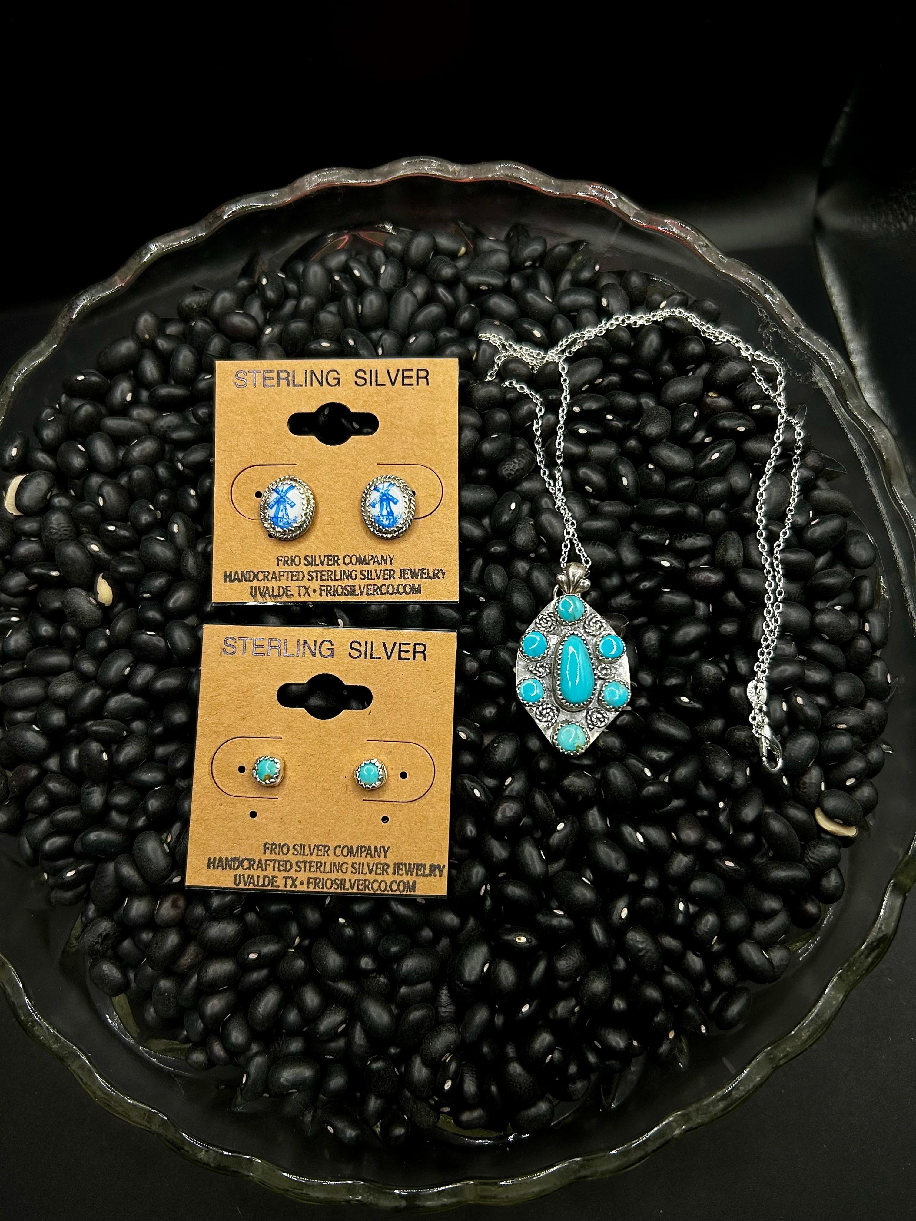 An image of sterling silver necklaces and earrings made by Sarah Haby