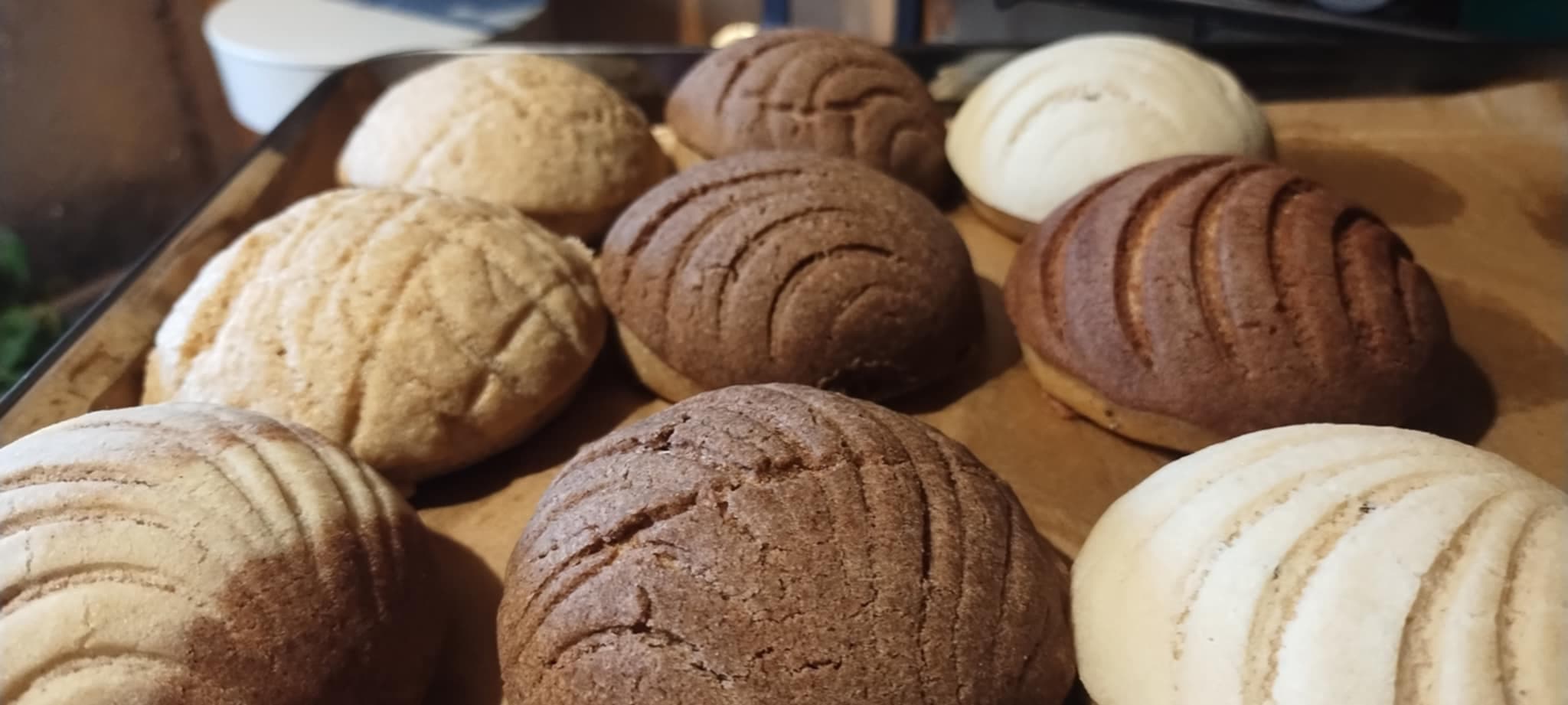 An image of brown, tan and white conchas