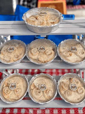 An image of cinnamon rolls in foil containers