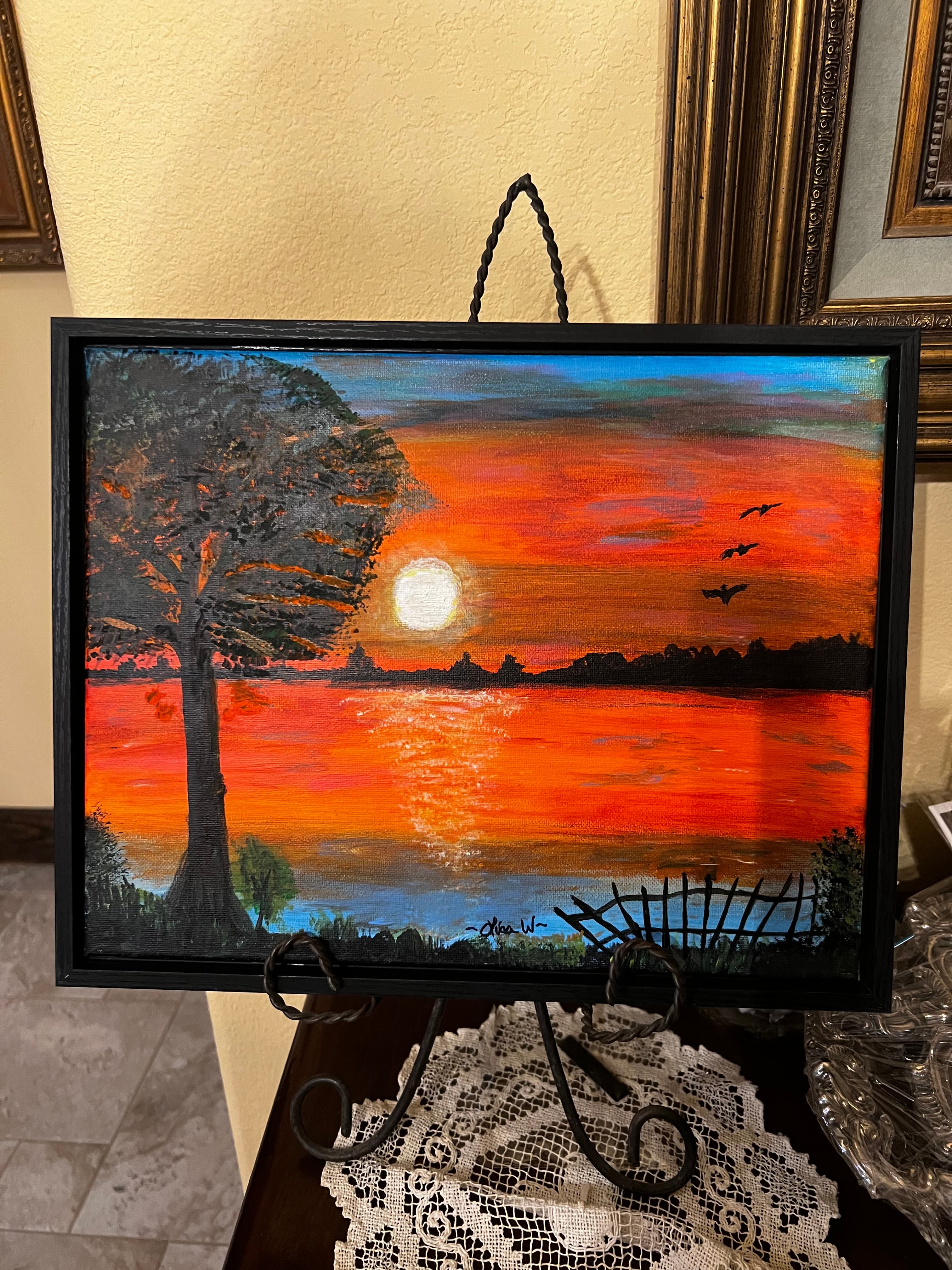 A painting of a sunset by Lisa Westmoreland