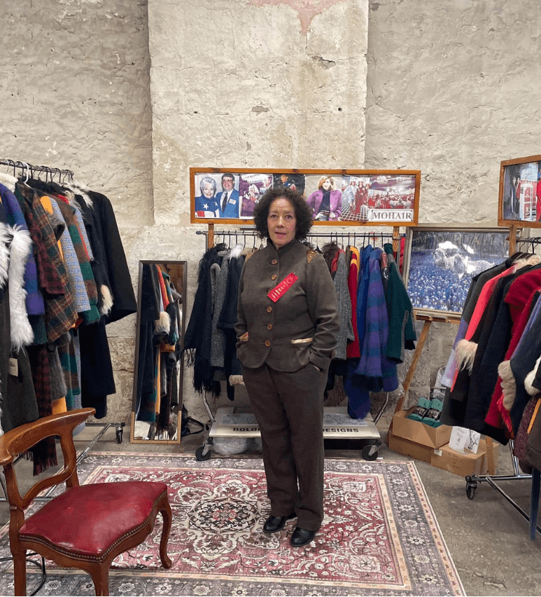Dolores in front of her Mohair gallery