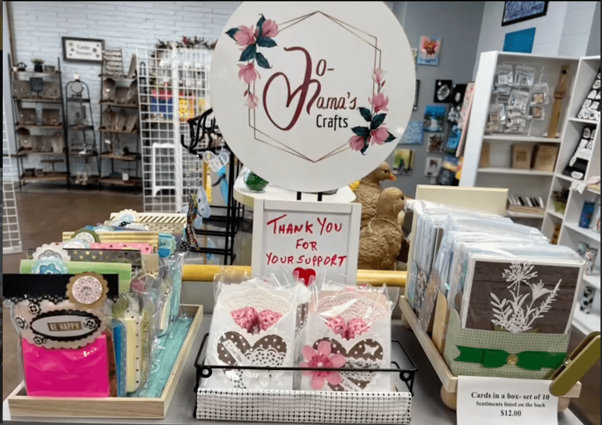 Jomama's Crafts set up of journals and notecards